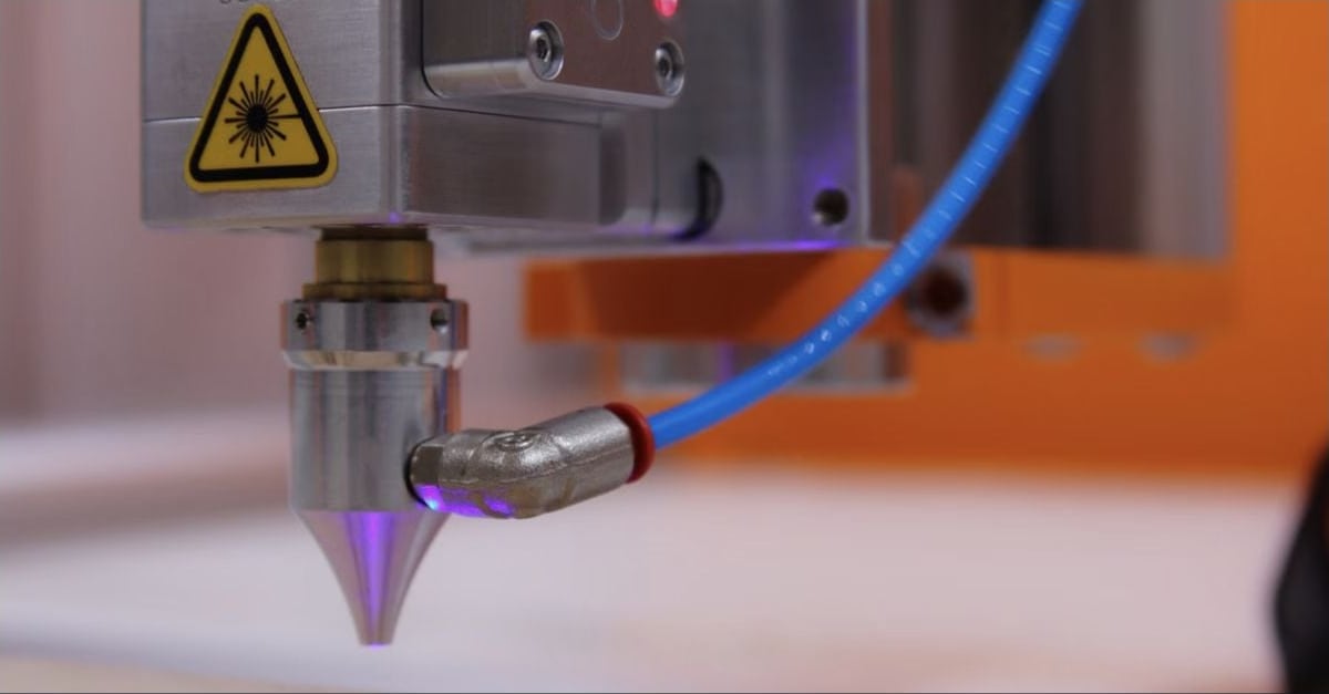 Laser engraving machine working on a material surface